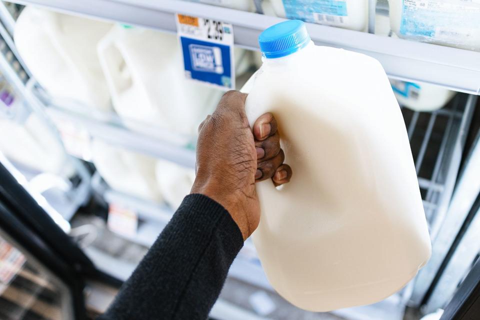 <p>Getty</p> Stock image of milk at a grocery store.