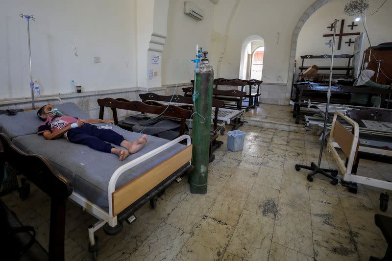 Gaza's Baptist Church turned into a clinic as patients and the wounded crowd hospitals