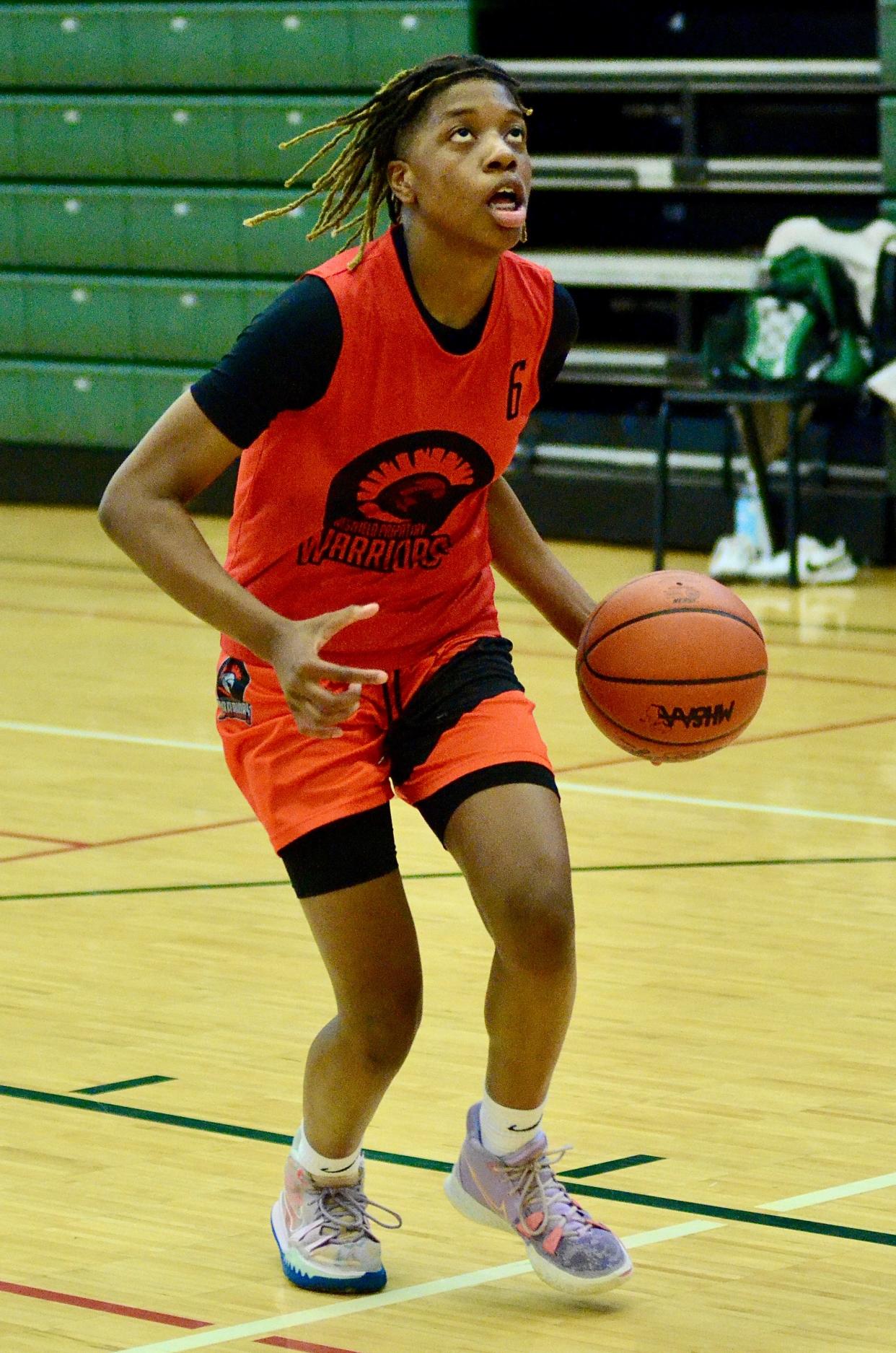 Redford Westfield Prep's Isis Johnson Musah attacks the basket during the Derrick Coleman Elite girls basketball showcase against Hamtramck on Wednesday, June 15, 2022, at Birmingham Groves.