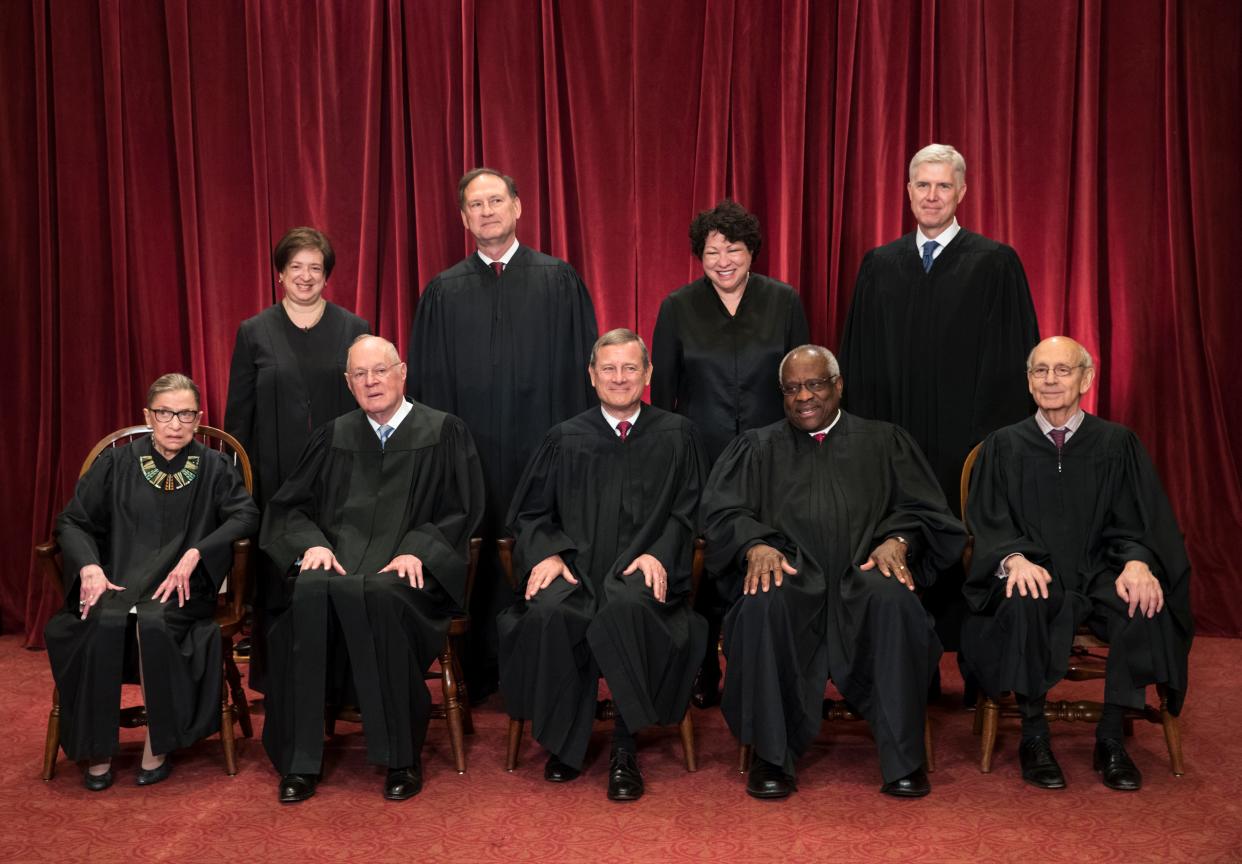 The justices of the U.S. Supreme Court gather for an official group portrait in 2017 with new Associate Justice Neil Gorsuch, back row, far right. Justice Clarence Thomas is in the front row, second from right.