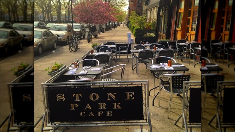 ouside the Stone Park Cafe tables
