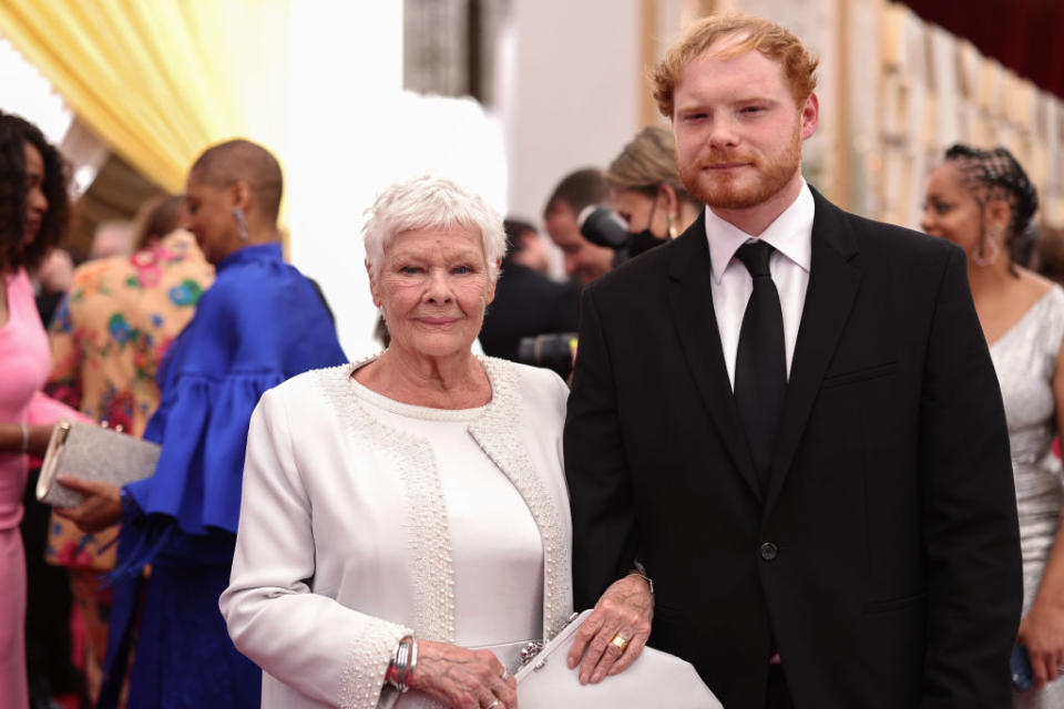 Dame Judi Dench took her grandson as her date to the Oscars. (Getty Images)