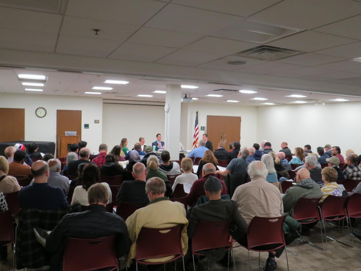 Parsippany residents fill a town hall at the Parsippany Library hosted by Councilman Justin Musella in opposition to a series of PILOT programs proposed by the mayor and council majority for developers hoping to replace vacant office buildings. December 13, 2023.