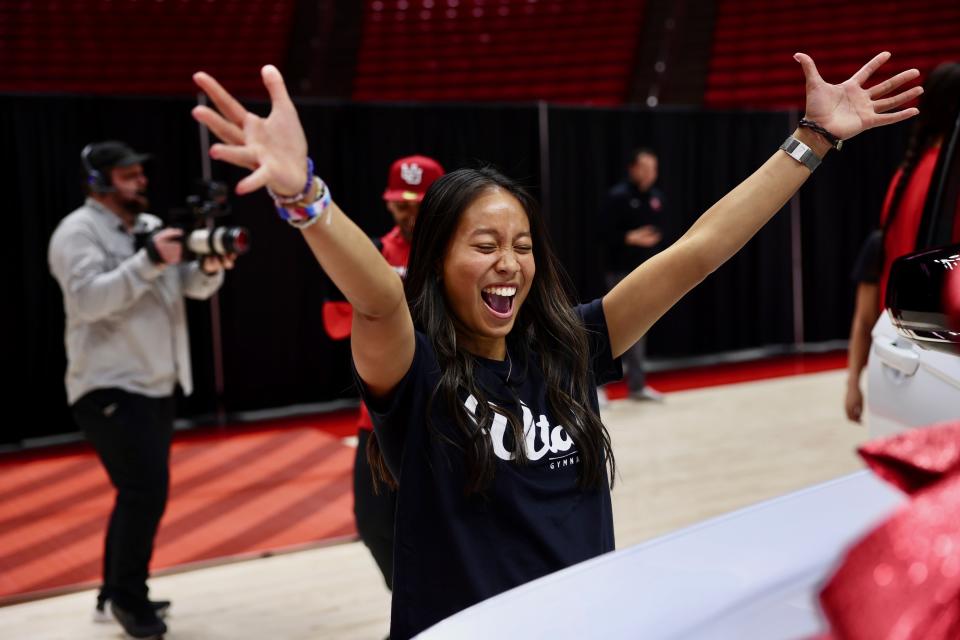 Utah gymnast Alani Sabado celebrates during an NIL announcement Wednesday, Dec. 13, 2023, at the Huntsman Center in Salt Lake City. The Crimson Collective announced plans to provide every Utah gymnast and men’s and women’s basketball athlete a free lease of an SUV or truck as part of a new NIL deal. | Laura Seitz, Deseret News