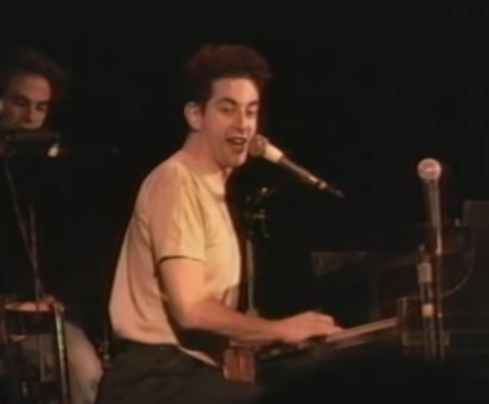 Jonathan Larson performing piano and singing