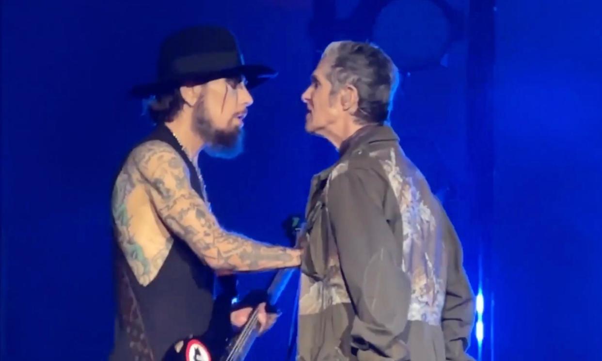 <span>Dave Navarro (left) and Perry Farrell of Jane's Addiction on stage in Boston.</span><span>Photograph: Song Stories Rewind/YouTube</span>