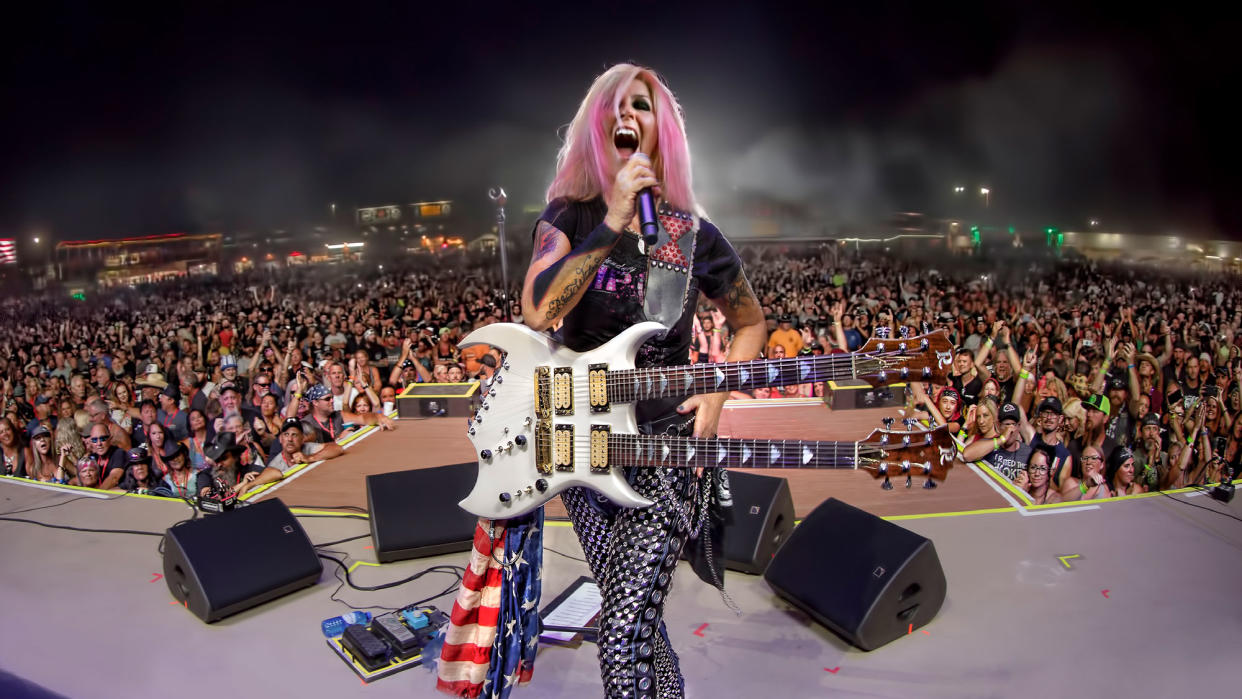  Lita Ford performs live with a B.C. Rich double-neck. 