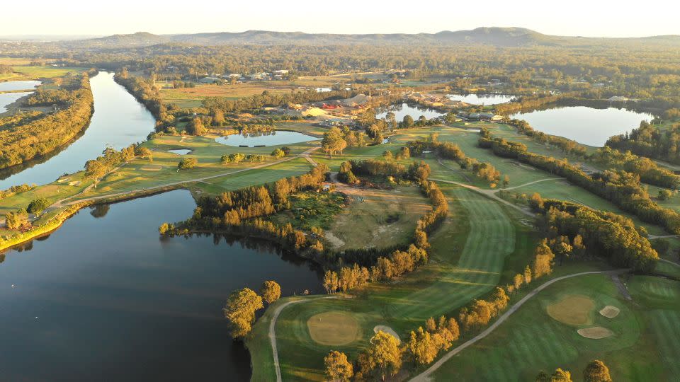 Severe flooding opened up a route for the sharks to cross from the river (left) to the course's lake. - Courtesy Carbrook Golf Club