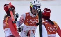 Alpine Skiing - Pyeongchang 2018 Winter Olympics - Women's Alpine Combined - Jeongseon Alpine Centre - Pyeongchang, South Korea - February 22, 2018 - Michelle Gisin of Switzerland, Lindsey Vonn of the U.S. and Wendy Holdener of Switzerland are seen during the the Women's Slalom part of the Women's Alpine Combined. REUTERS/Toby Melville