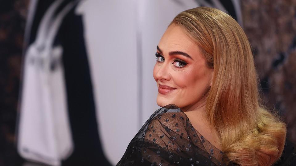 Adele wears a black dress as she attends The BRIT Awards 2022 at The O2 Arena on February 8, 2022 in London, England.