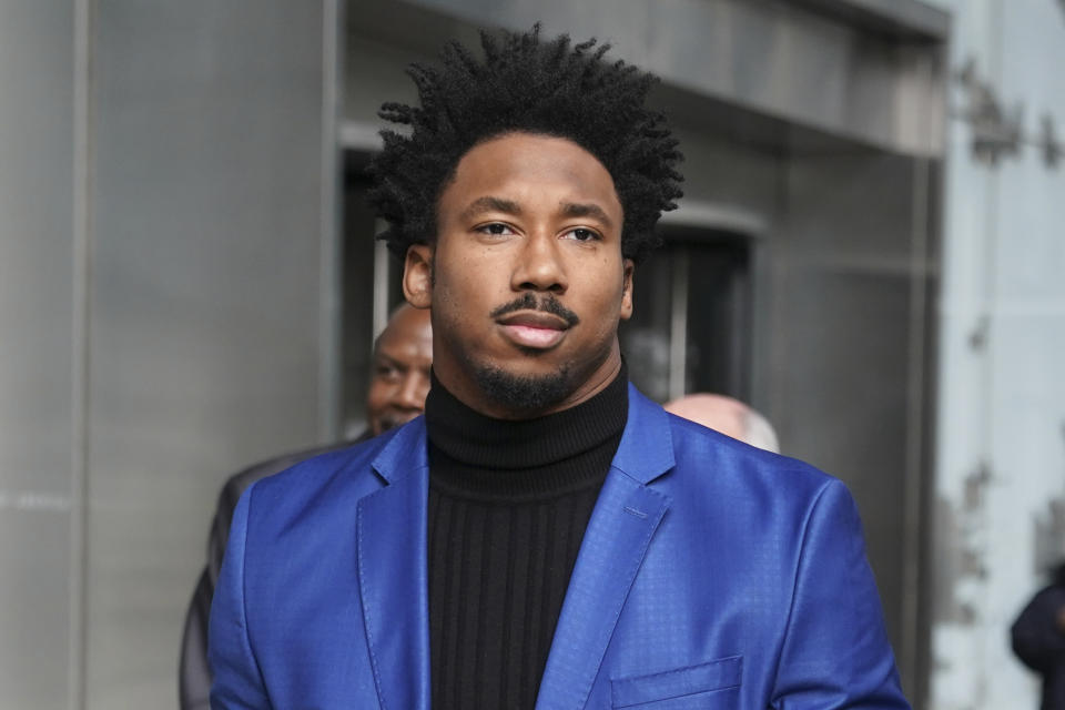 Browns end Myles Garrett leaves his suspension appeal hearing in New York. (AP Photo/Seth Wenig)