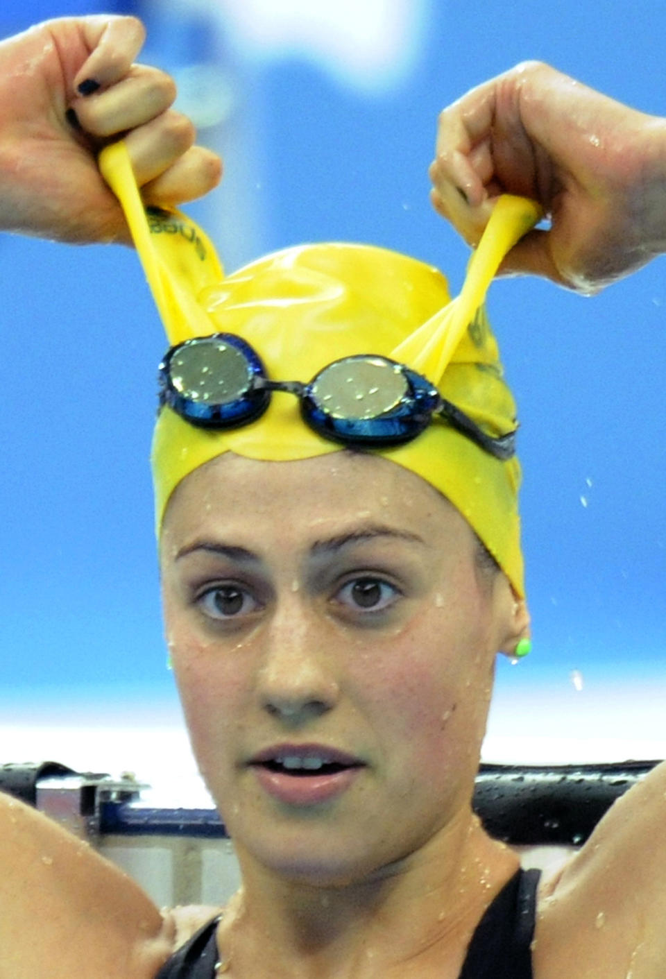 Australia's Stephanie Rice takes of her cap after her victory in the women's 400m individual medley swimming final at the National Aquatics Center in the 2008 Beijing Olympic Games on August 10, 2008 in Beijing. (FRANCOIS XAVIER MARIT/AFP/Getty Images)