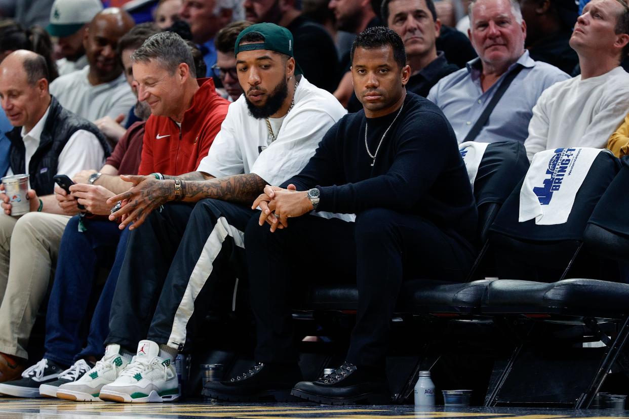 Denver Broncos quarterback Russell Wilson looks on during Game 5 between the Nuggets and Phoenix Suns.