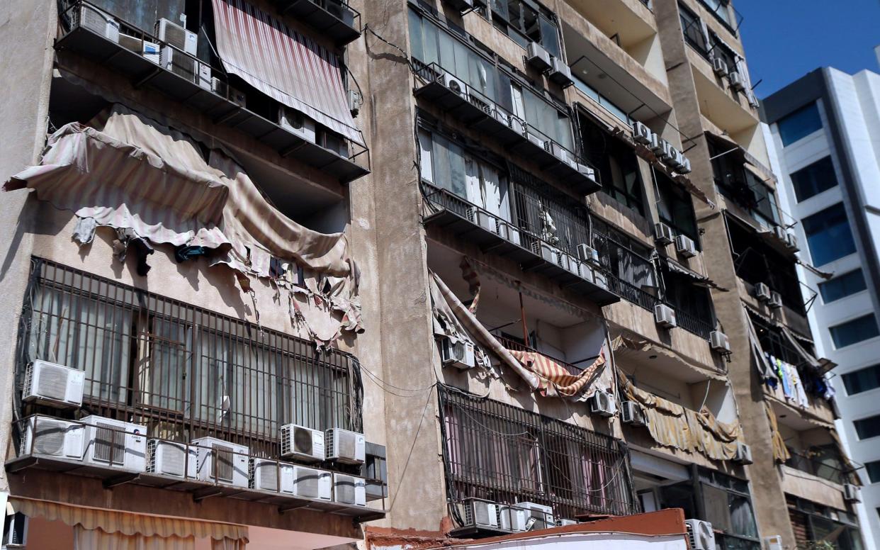 An exterior view of the building that houses the media office of Hizbollah after an alleged attack carried by two Israeli drones - REX