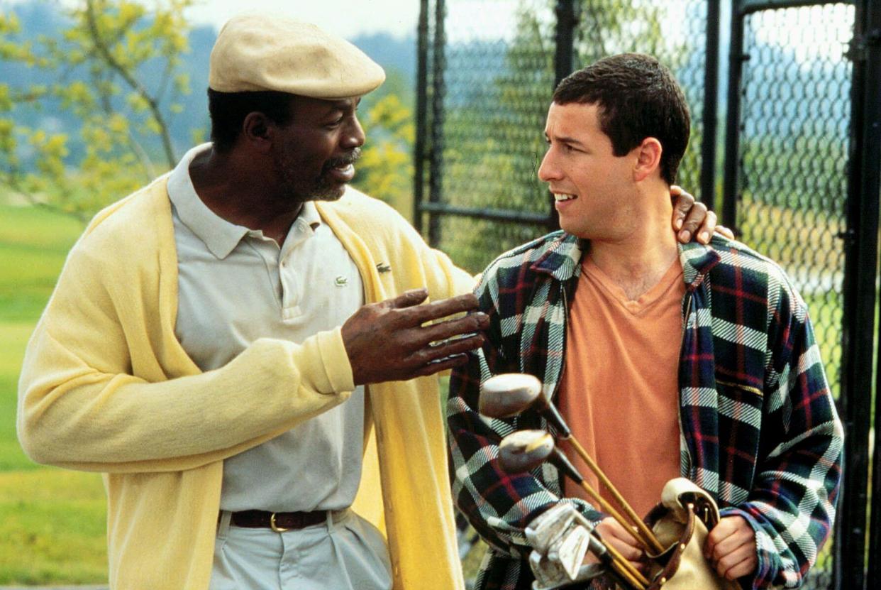 Carl Weathers and Adam Sandler in a scene from Happy Gilmore