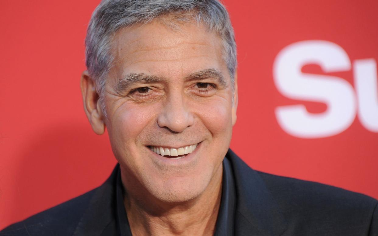 George Clooney attends the LA premiere of his latest directorial project Suburbicon in October - WireImage