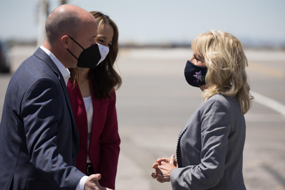 Utah Gov. Spencer Cox, left, and Utah first lady Abby Cox greet first lady Jill Biden on Wednesday, May 5, 2021 at Salt Lake City International Airport's TAC Air terminal. Biden visited a local middle school to teachers for their diligence and hard work during the pandemic and ended her day visiting a local vaccination site. (Spenser Heaps/The Deseret News via AP)