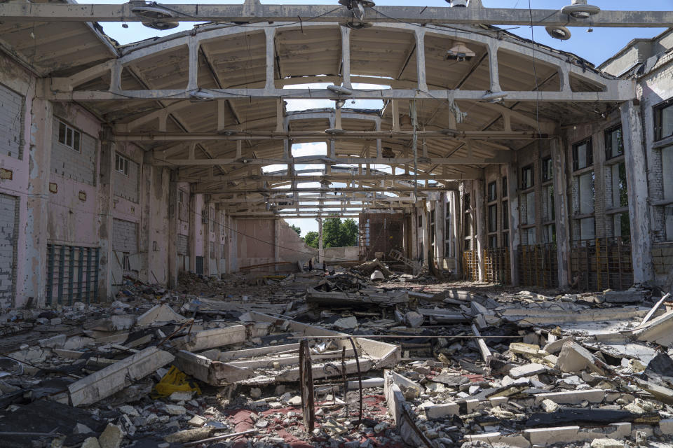 The athletics arena of the "Polytechnic" sports complex, which was destroyed by a Russian rocket attack in Kharkiv, Ukraine, is seen on Friday, June 7, 2024. It takes a decade and a national infrastructure of training facilities, feeder schools, equipment, and coaches to nurture an Olympic champion, and a process that begins in early childhood ends up winnowing out most contenders long before they reach the Games. (AP Photo/Evgeniy Maloletka)