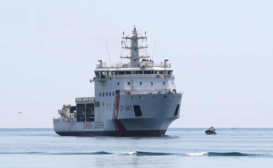 FILE - This July 12, 2018 file photo shows the Diciotti ship of the Italian Coast Guard carrying rescued migrants as it enters the Sicilian port of Trapani, southern Italy. Interior Minister Matteo Salvini demanded Sunday, Aug. 19, 2018, that other European countries take in the 177 migrants rescued on Aug. 16 by the Diciotti after his Maltese counterpart, Michael Farrugia, insisted that the "only solution" is for the Diciotti ship to dock at the Sicilian island of Lampedusa. (Igor Petyx/ANSA via AP)