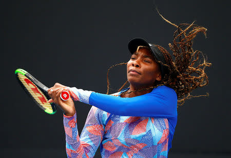 Venus Williams of the USA hits a shot during a practice session ahead of the Australian Open tennis tournament. REUTERS/David Gray