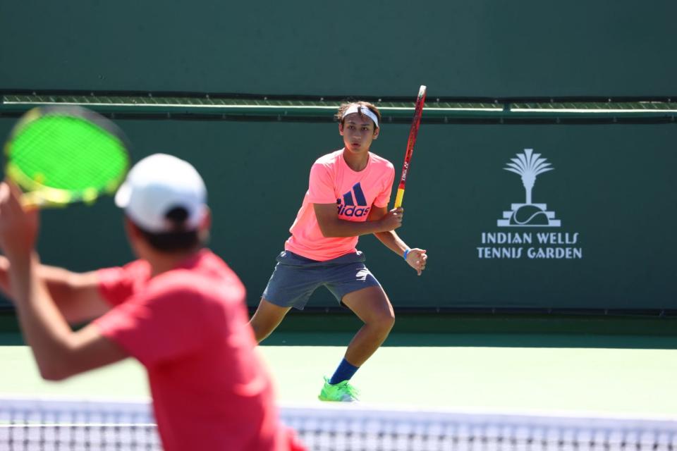 Boys participate in Easter Bowl qualifying at the Indian Wells Tennis Garden in 2022.