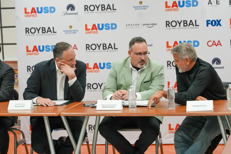 Second gentleman Douglas Emhoff, (left to right) and Education Secretary Miguel Cardona joined actor George Clooney at Roybal in January. (U.S. Department of Education)