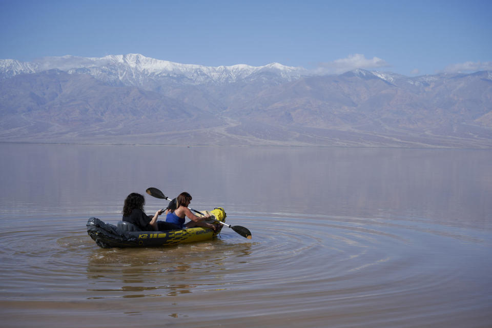 Kayakers on Lake Manly in Death Valley National Park on Feb. 27, 2024. (Bridget Bennett / The Washington Post via Getty Images file)