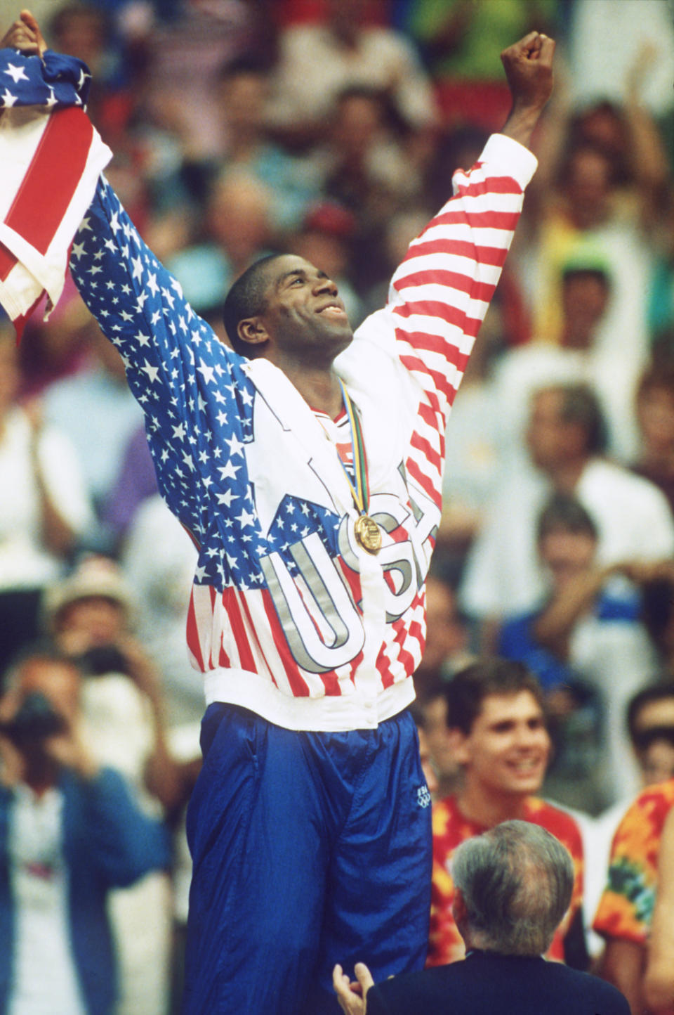 USA's Magic Johnson celebrates winning gold