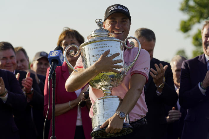 Justin Thomas holds the Wanamaker Trophy after winning the PGA Championship golf tournament in s playoff against Will Zalatoris at Southern Hills Country Club, Sunday, May 22, 2022, in Tulsa, Okla. (AP Photo/Eric Gay)