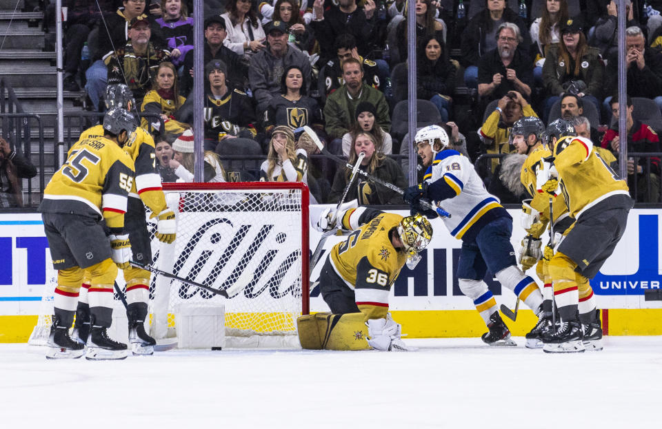 Vegas Golden Knights goaltender Logan Thompson (36) is scored on with St. Louis Blues center Robert Thomas (18) close in during the second period of an NHL hockey game Friday, Dec. 23, 2022, in Las Vegas. (AP Photo/L.E. Baskow)