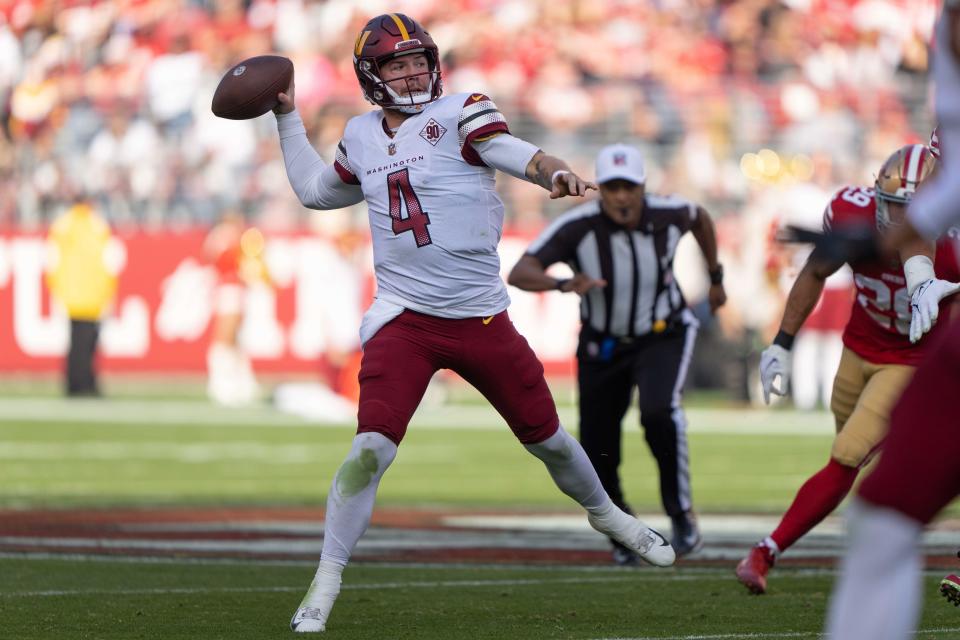 Washington Commanders quarterback Taylor Heinicke (4) throws the football during the second quarter against the San Francisco 49ers at Levi's Stadium.