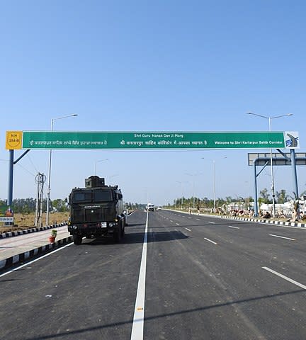 The Kartarpur Sahib Corridor, first proposed by former PM Atal Bihari Vajpayee in 1999, was inaugurated on November, 9. The corridor, which links Gurdwara Darbar Sahib in Pakistan's Kartarpur to Dera Baba Nanak shrine in India's Gurdaspur district, allows Indian pilgrims to visit the Gurdwara, located five kms from the border in Punjab, Pakistan, visa-free. The corridor was thrown open during the 550th birth anniversary of Guru Nanak, with Prime Minister Narendra Modi flagging off the first batch of more than 500 pilgrims. The site is important to Sikhs because Guru Nanak Dev chose the area to settle down after his missionary work and spent his last 18 years farming in Katarpur. <em><strong>Image credit:</strong></em> Entrance of the Kartarpur Sahib Corridor (or Nanak Marg) from Dera Baba Nanak side of Indian border By Harvinder Chandigarh - Own work, CC BY-SA 4.0, https://commons.wikimedia.org/w/index.php?curid=83924937