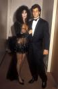 <p>Cher has worn plenty of black sheer looks, but the one she wore to the 1987 VMAs featured a bedazzled geometric pattern and a puffed tulle bustle right at the back.</p>