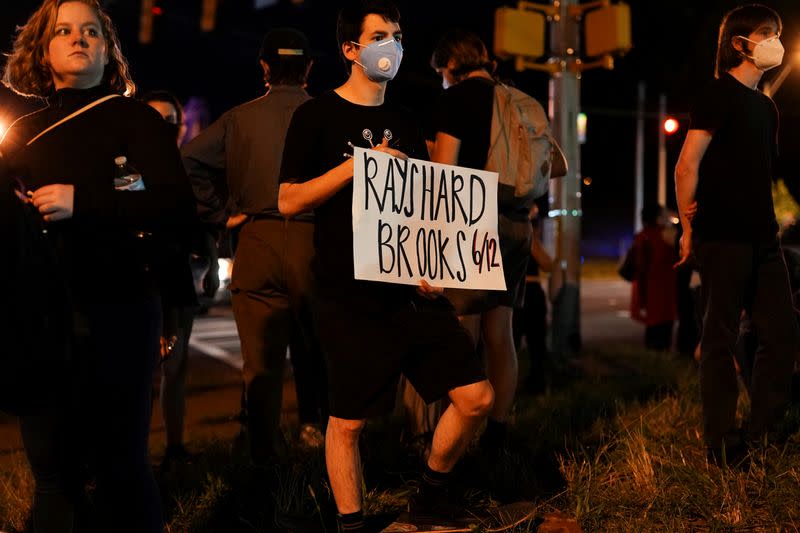 FILE PHOTO: Protesters rally against racial inequality and the police shooting death of Rayshard Brooks, in Atlanta