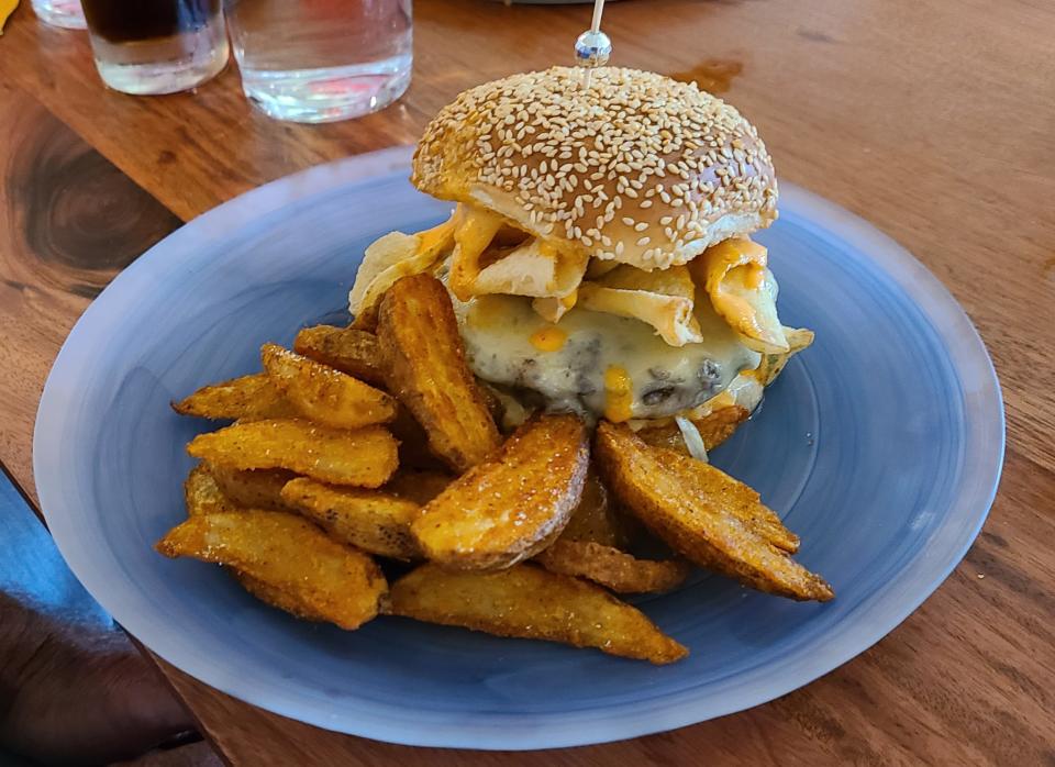 Bicyclette Cookshop's "Big Mac" riff with potato wedges, $22 is a tribute to partner Louis Mele, McDonald's former president in Canada and Italy.