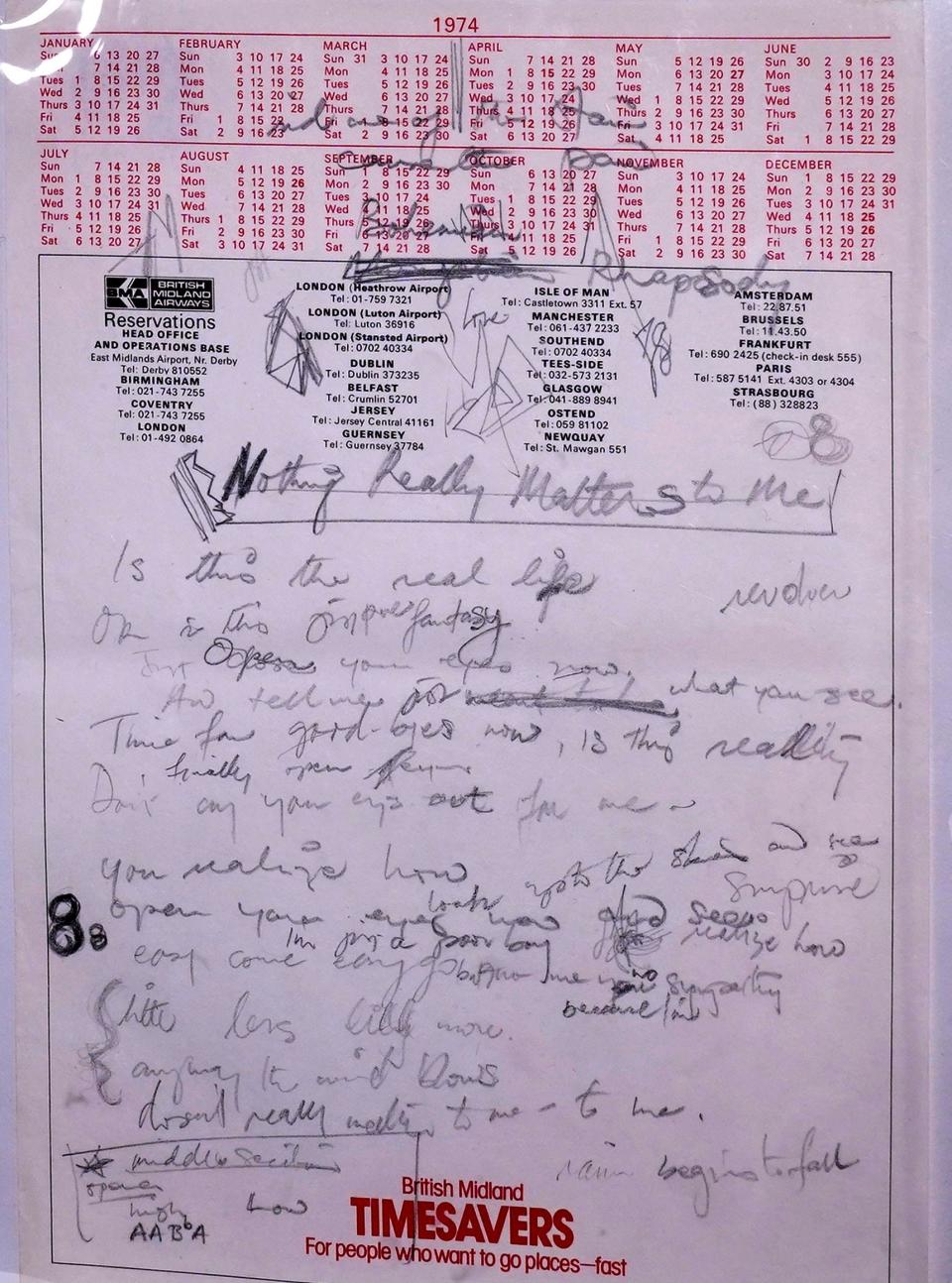 A manuscript of working lyrics for "Bohemian Rhapsody," autographed by British singer-songwriter Freddie Mercury, is displayed during the media preview for "Freddie Mercury: A World of His Own: The Evening Sale" at Sotheby's in New York City on June 1, 2023. More than 1,500 items from Mercury's private collection, including costumes and unique objects as well as the draft lyrics, will feature in the eventual auctions on September 6-8 in London and online Aug. 4-Sept. 11. The auction is expected to fetch at least 6 million pounds ($7.5 million).