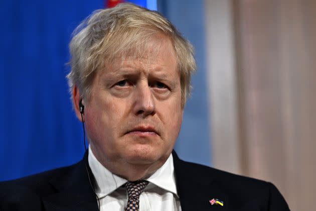 Britain's Prime Minister Boris Johnson, seen Friday, is being fined along with Chancellor Rishi Sunak for attending parties during a COVID-19 lockdown. (Photo: WPA Pool via Getty Images)