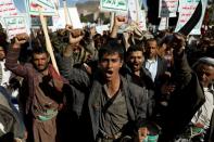 Houthi supporters rally against the United States' designation of Houthis as a foreign terrorist organisation, in Sanaa,