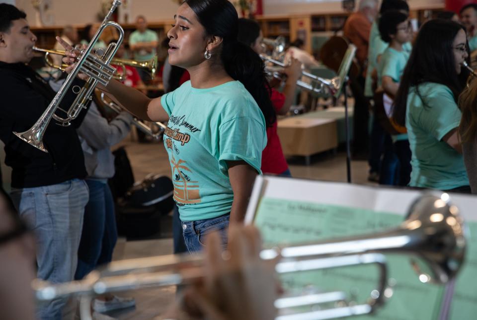 Intermediate trumpet instructor Yamila De La Rosa, of Texas A&M--Kingsville leads her students during a rehearsal at mariachi camp hosted by Robstown High School, on Thursday, June 29, 2023, in Texas.