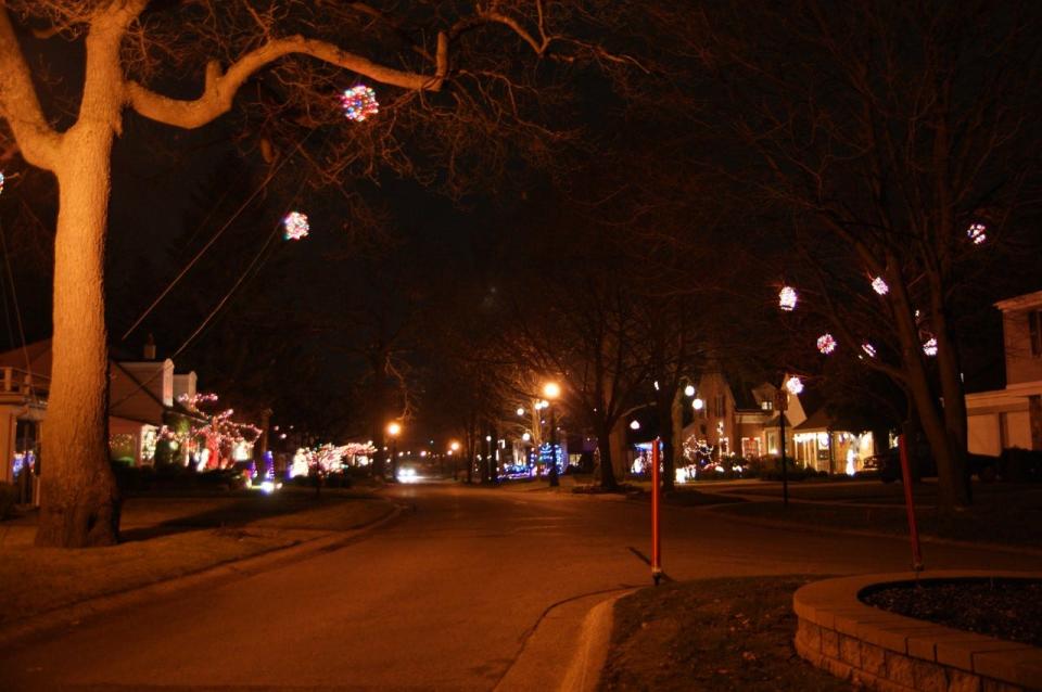 Every year, homeowners in the Port Huron neighborhood of Sherman Woods hang balls made from Christmas lights and set up Christmas decorations in their neighborhood.