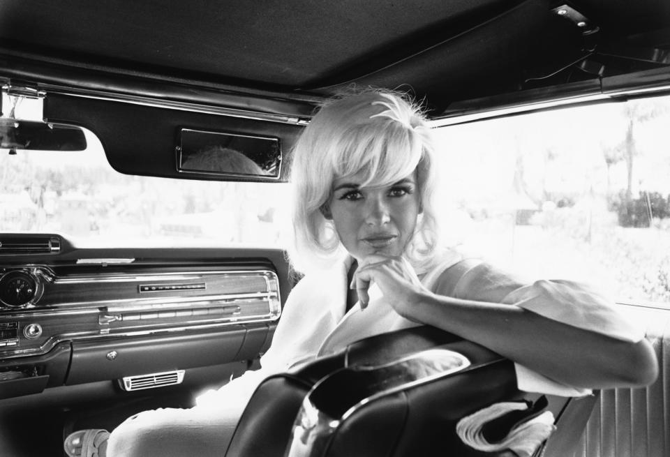 A portrait of Jayne Mansfield, born Vera Jayne Palmer, seated in an automobile. (Photo by © Hulton-Deutsch Collection/CORBIS/Corbis via Getty Images)