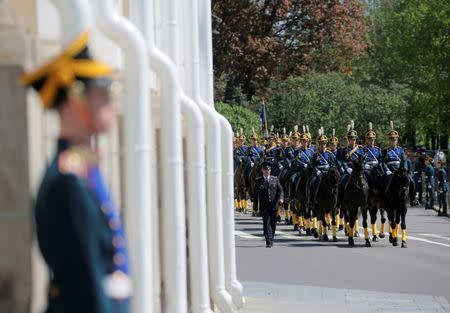 Members of the Guard of Honour of the Presidential regiment ride horses before a ceremony inaugurating Vladimir Putin as President of Russia at the Kremlin in Moscow, Russia May 7, 2018. Sputnik/Sergei Savostyanov/Pool via REUTERS