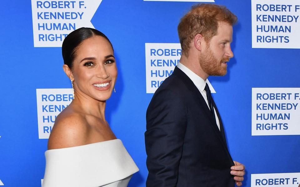 Meghan wore an off-the-shoulder Louis Vuitton dress - Getty