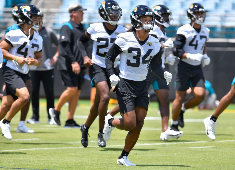 Jaguars (34) S Gregory Junior runs with teammates between drills. The Jacksonville Jaguars held their first Rookie Minicamp on the turf of TIAA Bank Field Friday afternoon, May 13, 2022. Among those in attendance were the team's 2022 draft picks.