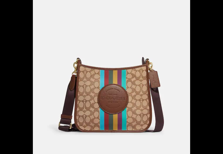 Dempsey File Bag In Signature Jacquard With Stripe And Coach Patch. Image via Coach Outlet.