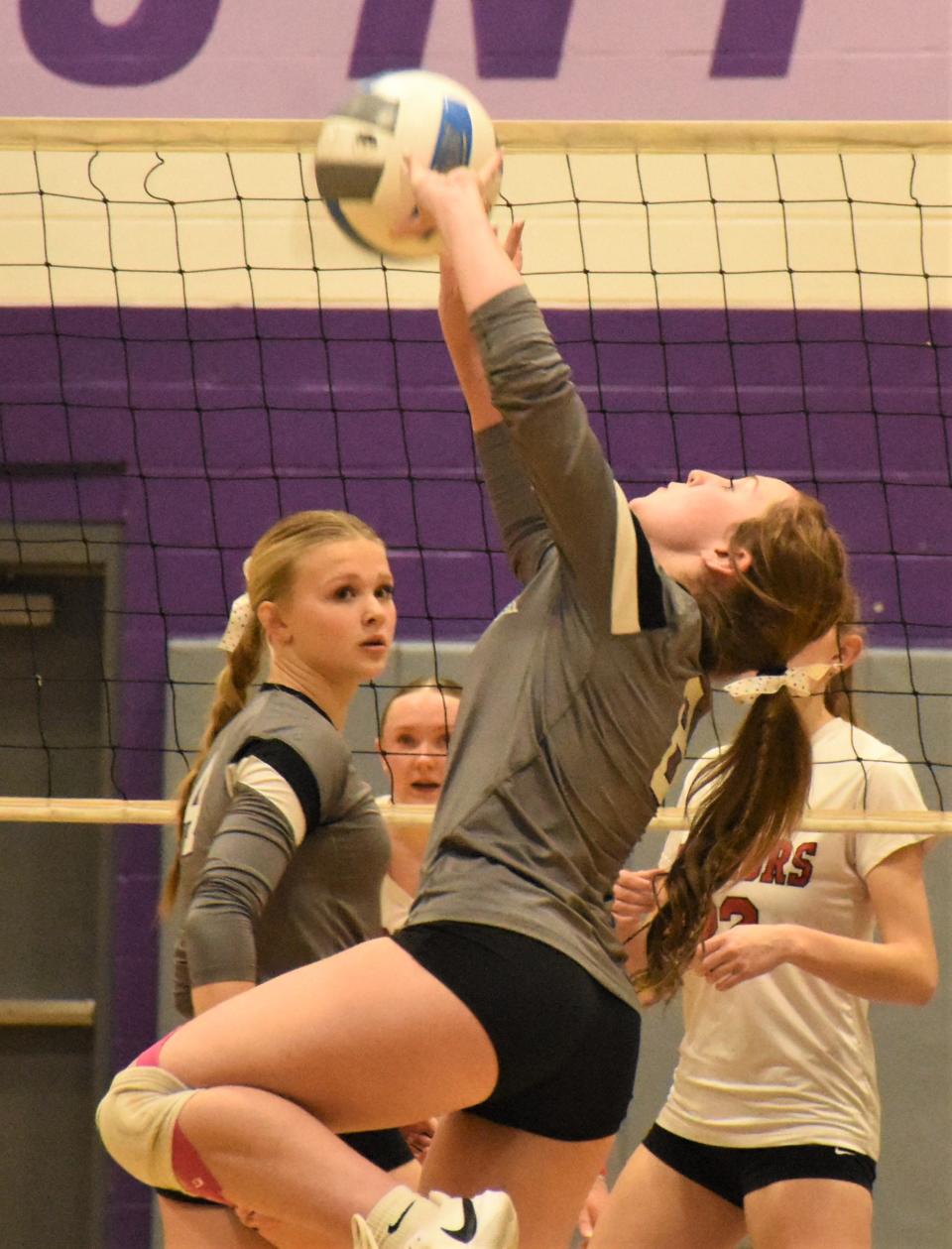 Molly Urich sets the ball for Little Falls during the first game of Wednesday's match against Morrisville-Eaton in Section III's Class C winter playoffs.