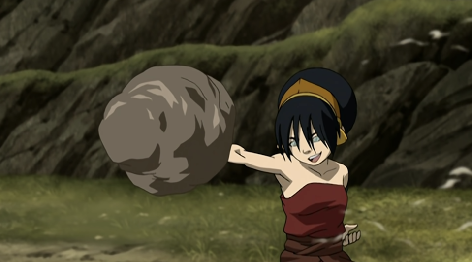 Toph punching a rock