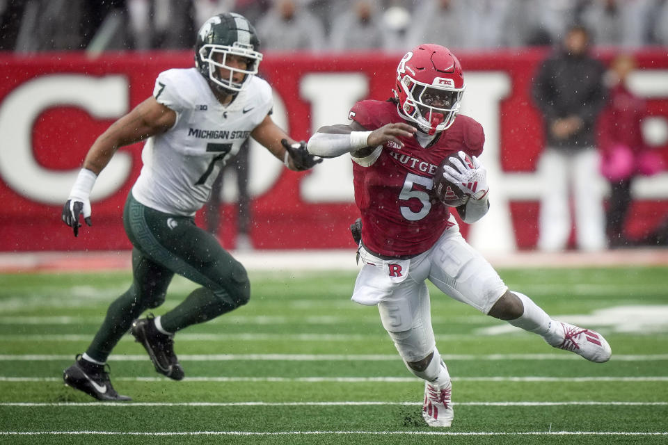 Rutgers running back Kyle Monangai (5) runs with the ball during the second half of an NCAA college football game against Michigan State Saturday Oct. 14, 2023, in Piscataway, N.J. (AP Photo/Bryan Woolston)