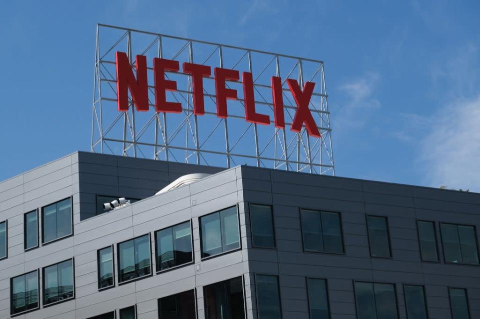 The Netflix logo is seen on top of their office building in Hollywood, California, 2 March 2022 (AFP via Getty Images)