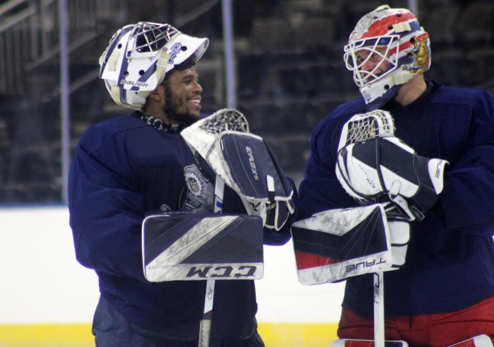 Jacksonville Icemen goaltenders smile during a pause in hockey practice at VyStar Veterans Memorial Arena on October 19, 2022. [Clayton Freeman/Florida Times-Union]